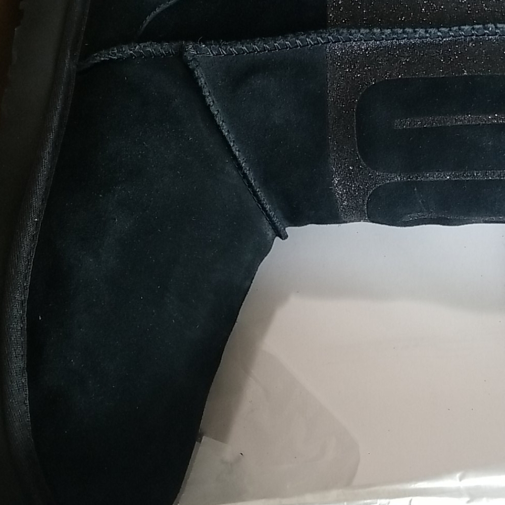 Never worn Uggs boot